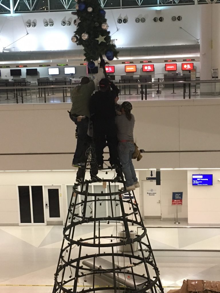 Holiday decorations installation at BWI airport